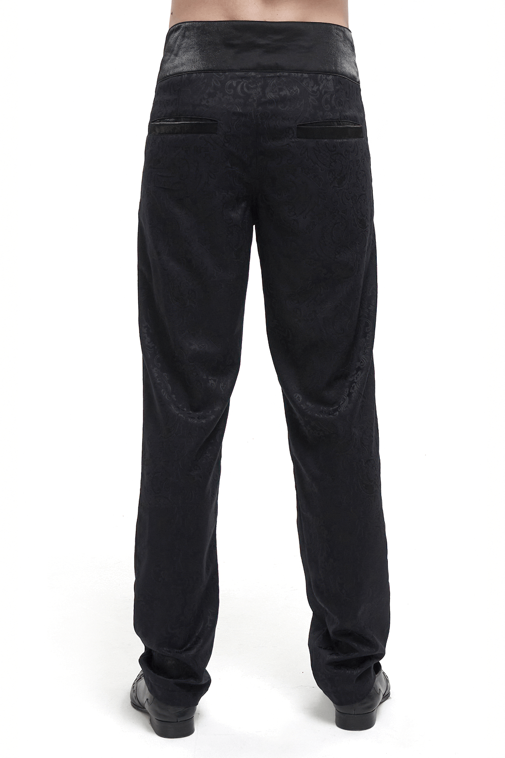Back view of vintage black jacquard high-waisted gothic pants for men, featuring stylish pockets and intricate texture.