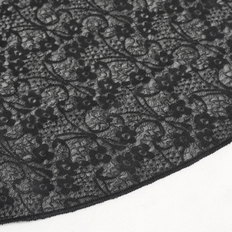 Close-up of intricate black lace fabric, perfect for vintage and gothic style clothing.