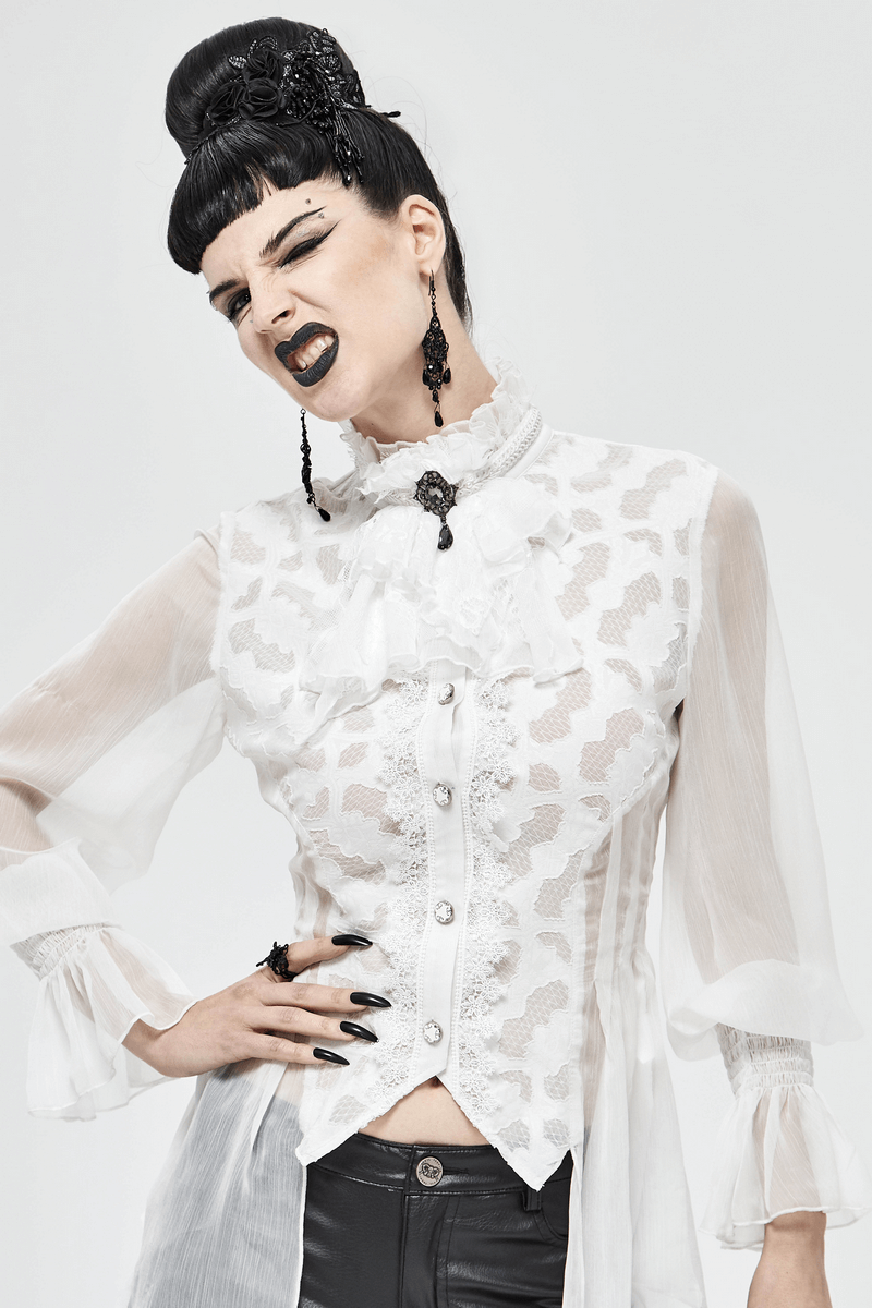 Vintage gothic model showcasing white lace blouse with dramatic sleeves and brooch, embodying alternative fashion style.
