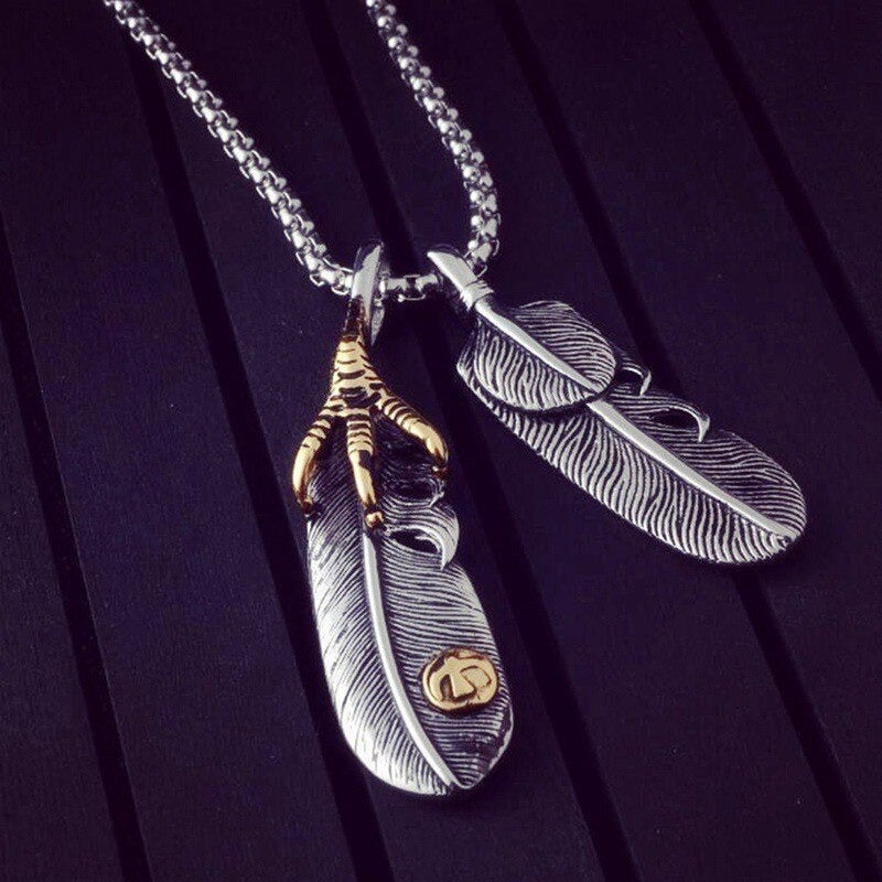 Vintage Leaf Long Pendant Necklace with feather detail in stainless steel, perfect for unique fashion statements.