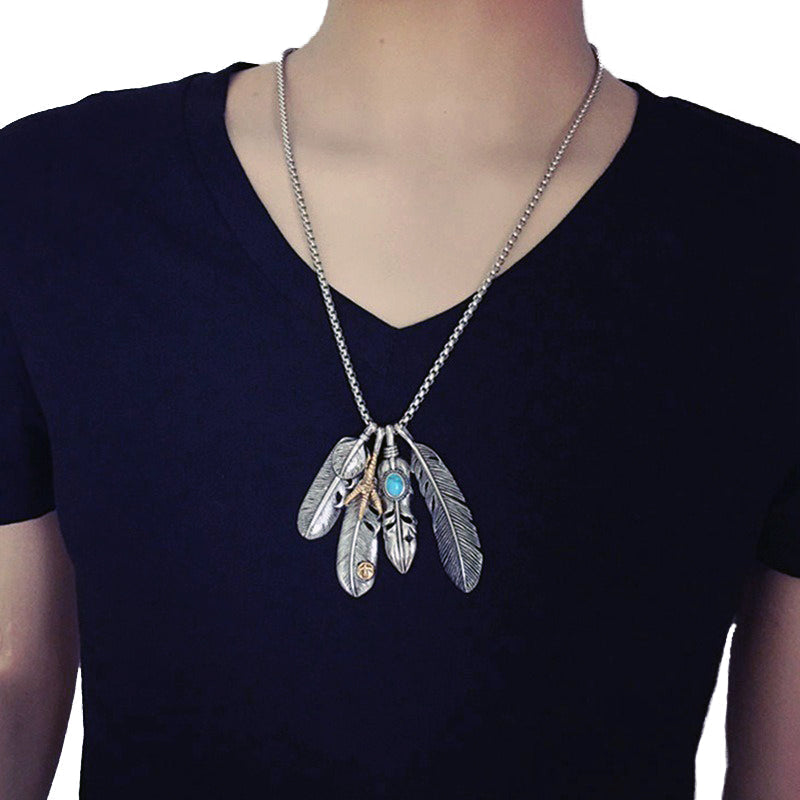 Vintage leaf long pendant necklace featuring feather details, perfect for stylish accessories and special occasions.