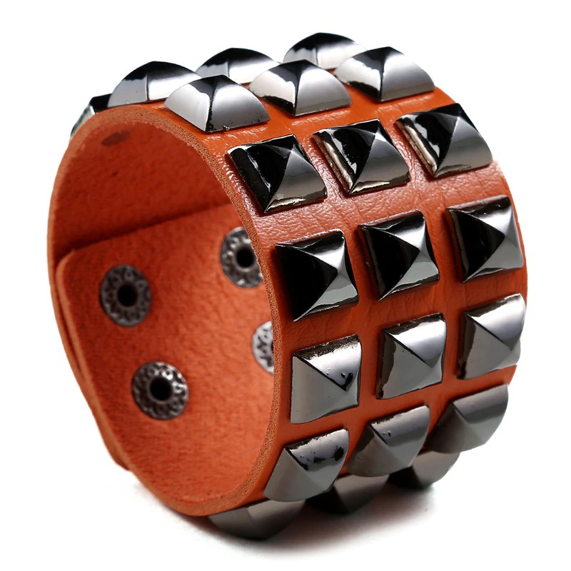 Vintage leather bracelet with spikes in punk rock style, perfect unisex accessory for fashion-forward individuals.