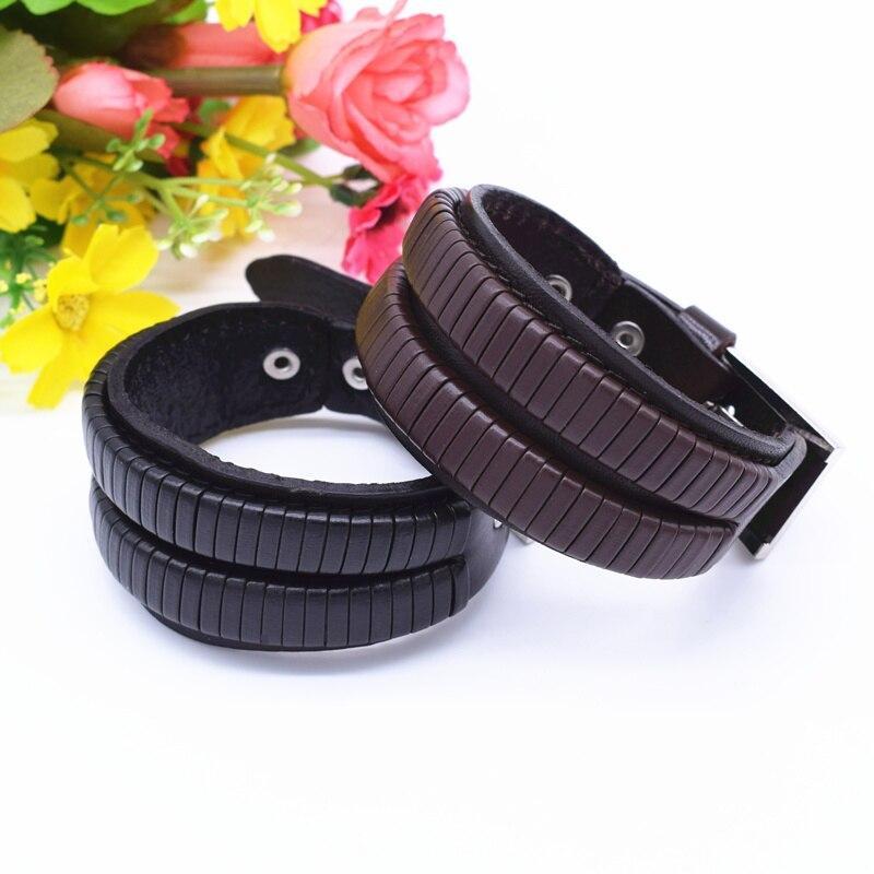 Vintage leather bracelet for men, featuring black and brown cuffs with double safety clasps and zinc alloy details.