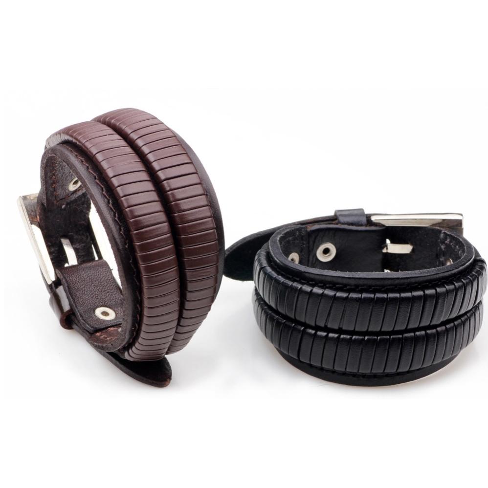 Vintage black and brown leather cuff bracelets with double-wide design and textured finish for men.