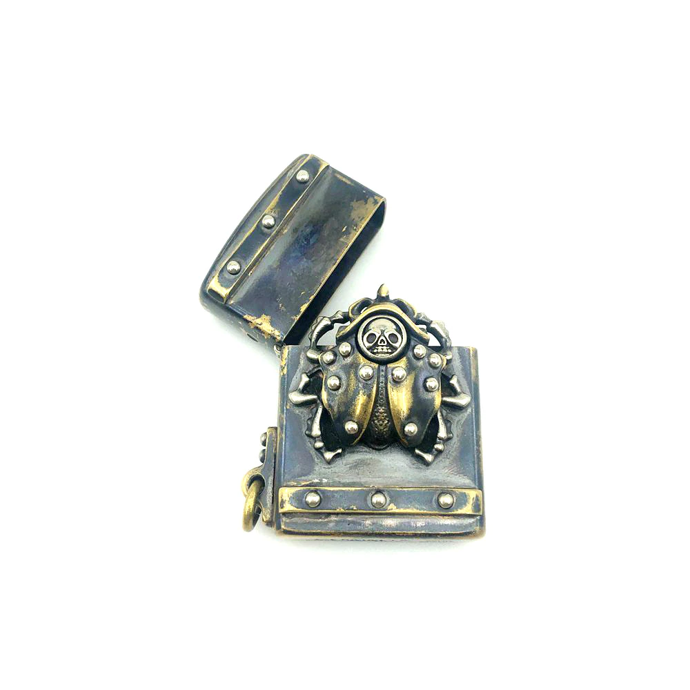 Vintage unisex lighter case with rivets and beetle design, perfect metal accessory for alternative style lovers.