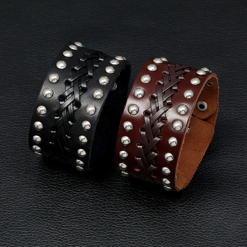 Vintage wide leather bracelets in punk rock style, featuring manual weave and silver rivets, in black and brown.