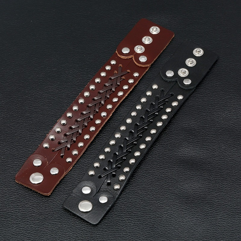 Vintage male leather bracelet set in brown and black with silver rivets and woven design, perfect for punk rock style.