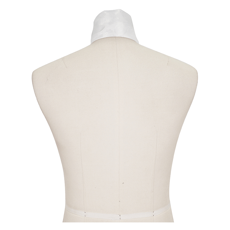 Back view of a vintage white male tie with crystal brooch on a dress form for gothic style outfits.