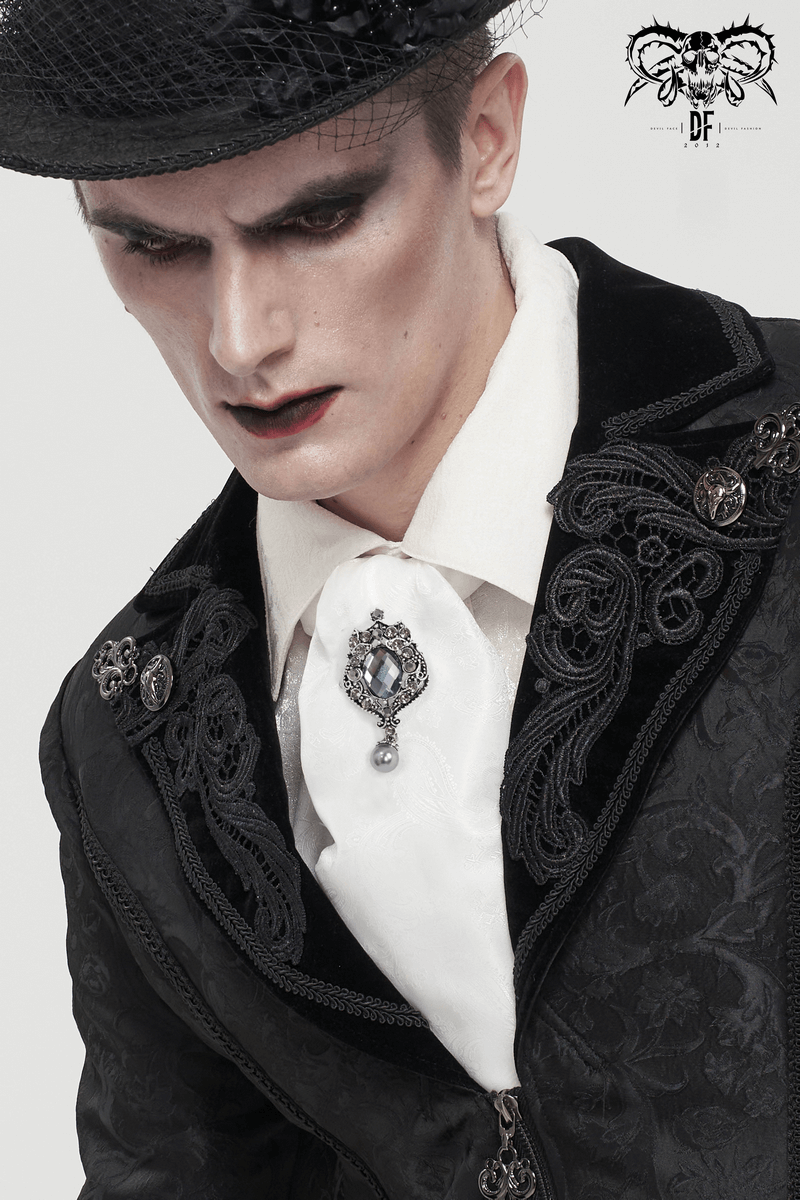Gothic vintage men's outfit featuring a white tie with crystal brooch and stylish black jacket.