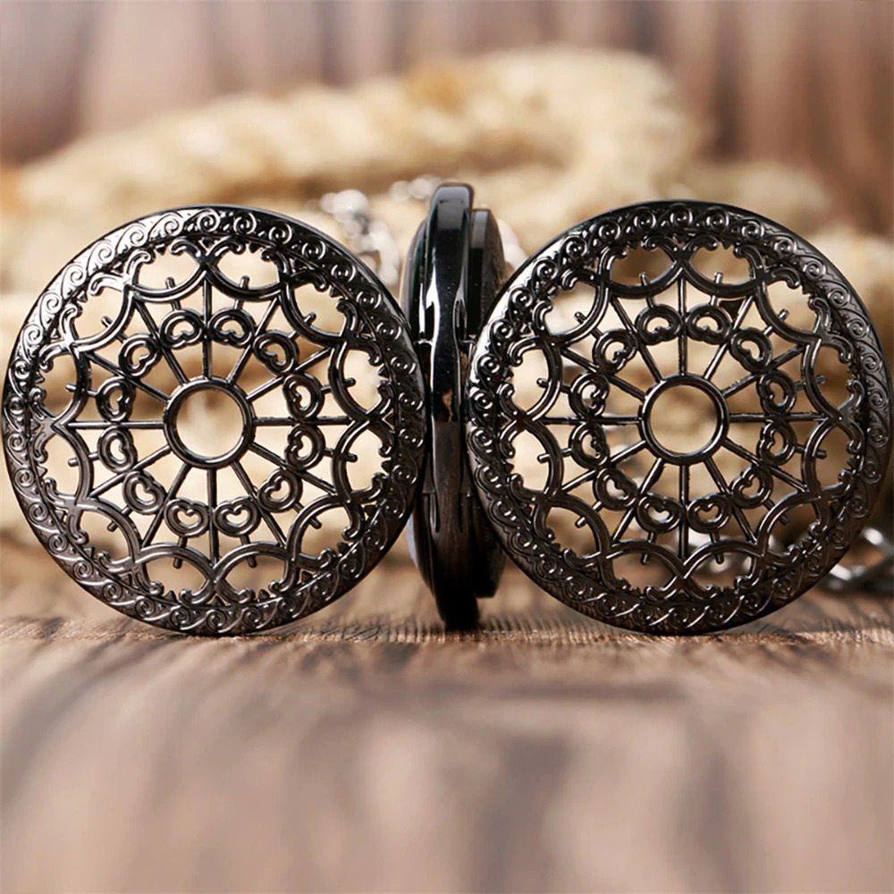 Intricate vintage mechanical watch with double cover design and chain in a retro black finish.