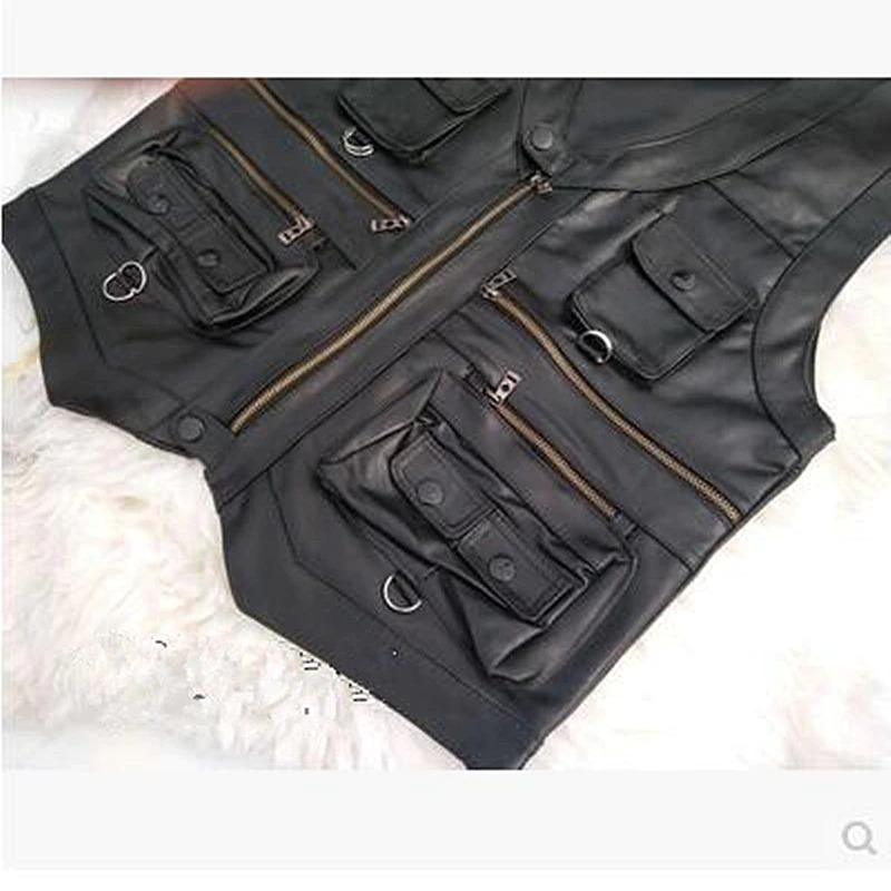 Vintage men's leather biker vest with multiple pockets, perfect for a rock-inspired motorcycle outfit.