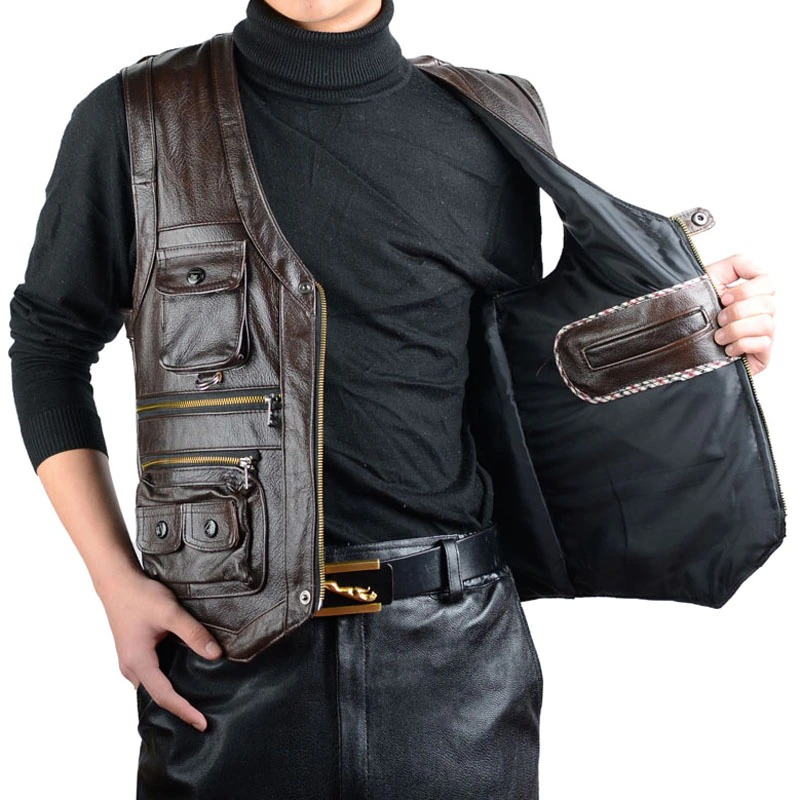 Men's vintage biker leather vest with pockets, showcasing rock style and genuine leather design.