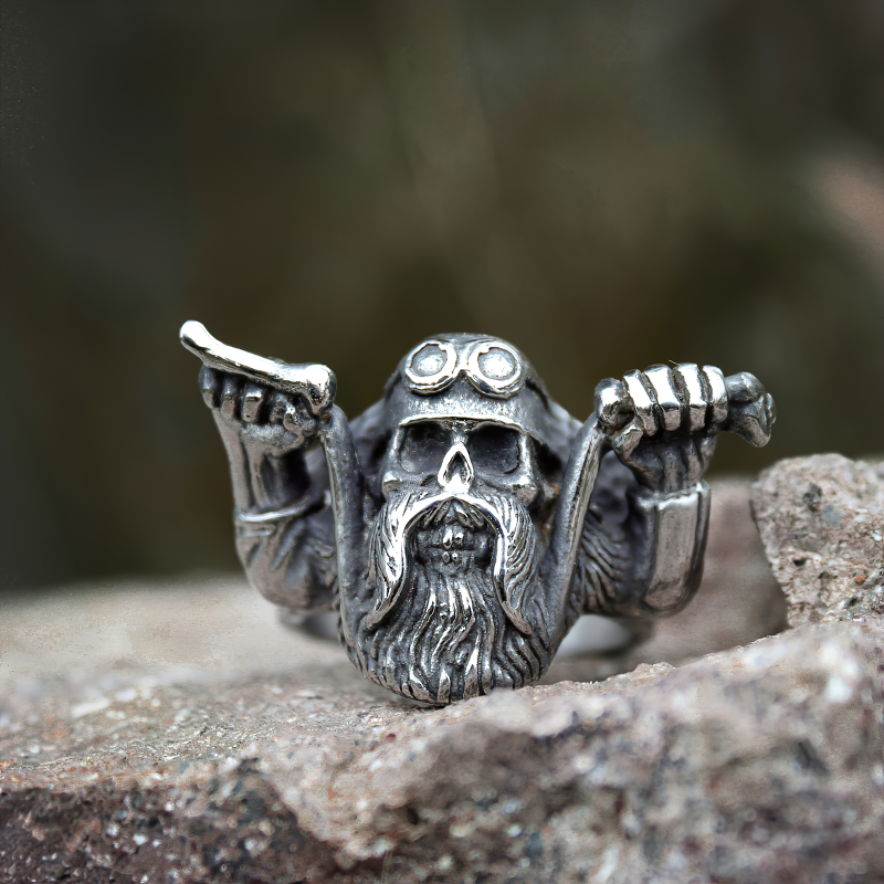 Vintage men's biker skull ring with a skeleton figure, perfect for rock style and motorcycle enthusiasts.