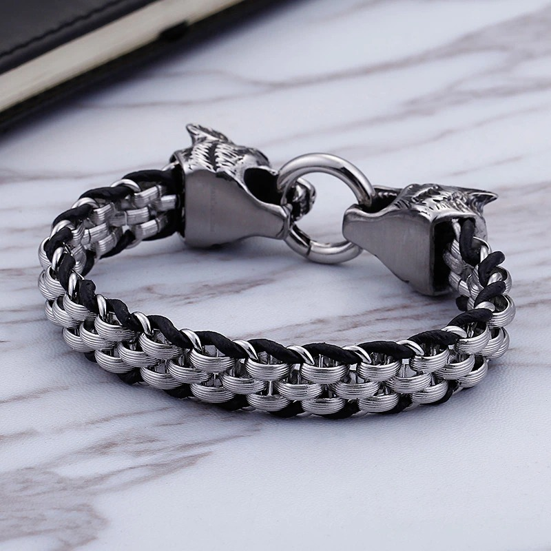 Vintage men's stainless steel bracelet featuring wolf head clasps, a stylish accessory for casual looks.