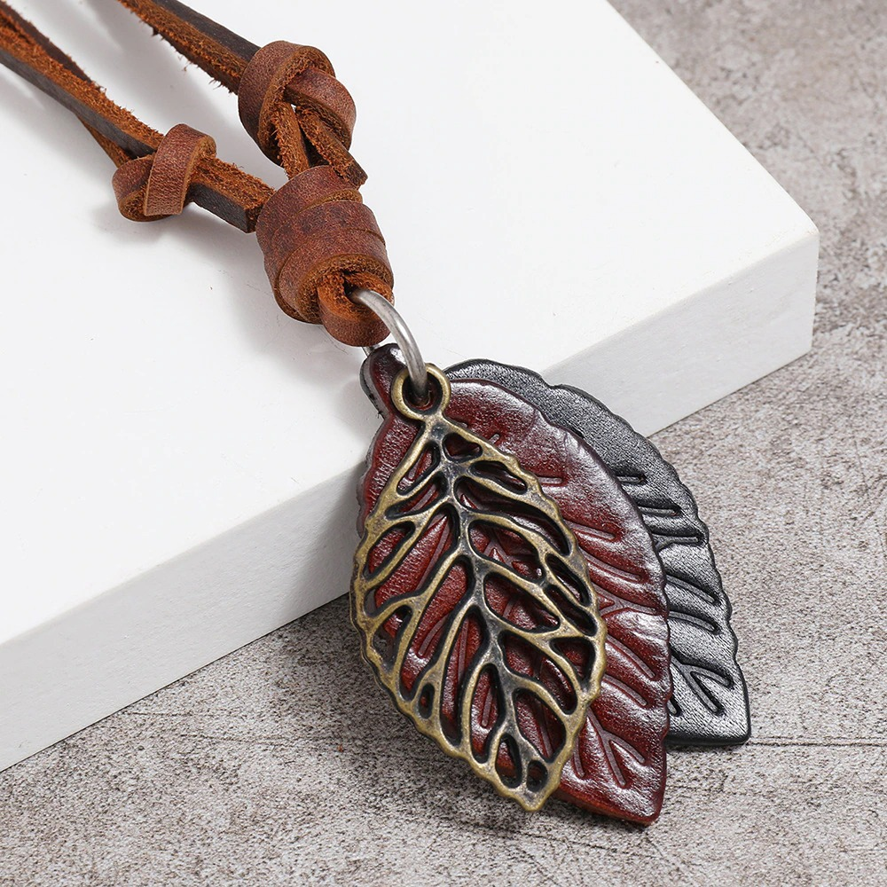 Vintage leather necklace with tree leaf pendants, featuring brown and black tones, perfect for punk style lovers.