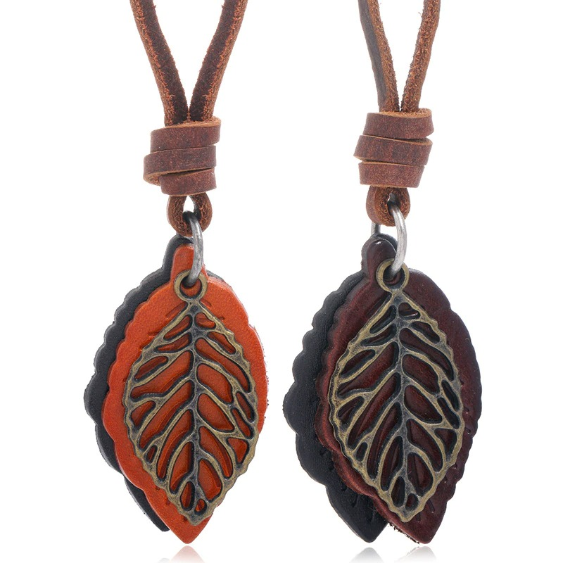 Vintage leather necklace with leaf pendants in brown and orange, embodying punk style elegance.