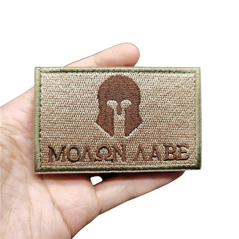 Unisex military embroidered patch with Spartan helmet design, perfect for fashionably accessorizing clothes.