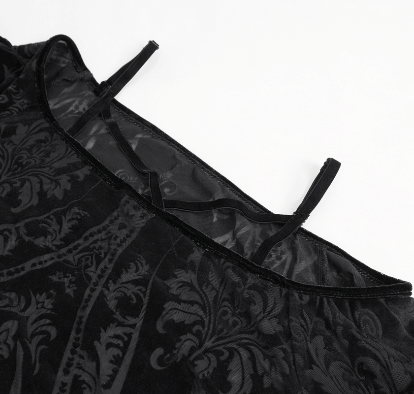 Close-up of a vintage pattern off-shoulder dress with cross straps, showcasing its stylish black design and intricate texture.