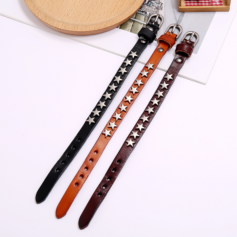 Vintage PU leather bracelets for men and women featuring silver stars, perfect for punk-rock style and trendy gothic jewelry.