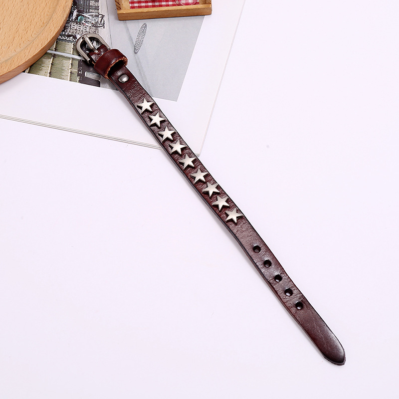 Vintage PU leather bracelet with silver stars, perfect unisex punk-rock jewelry for stylish looks.