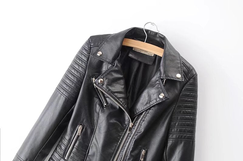 Vintage faux leather motorcycle jacket with slanting collar and zippers for a stylish biker look.