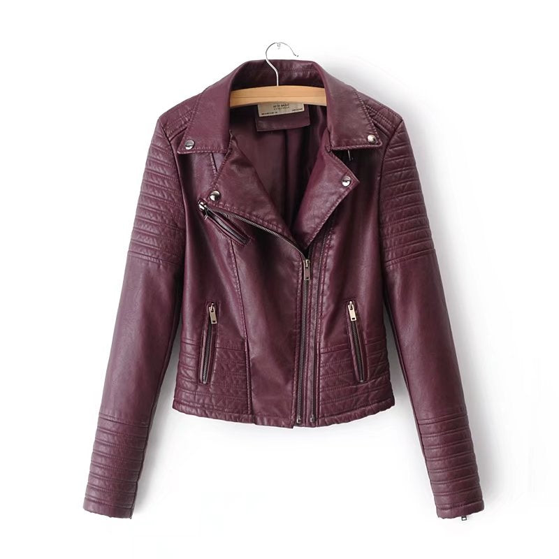 Vintage PU leather motorcycle jacket in burgundy with stylish zippers and ribbed detailing, perfect for women's biker fashion.