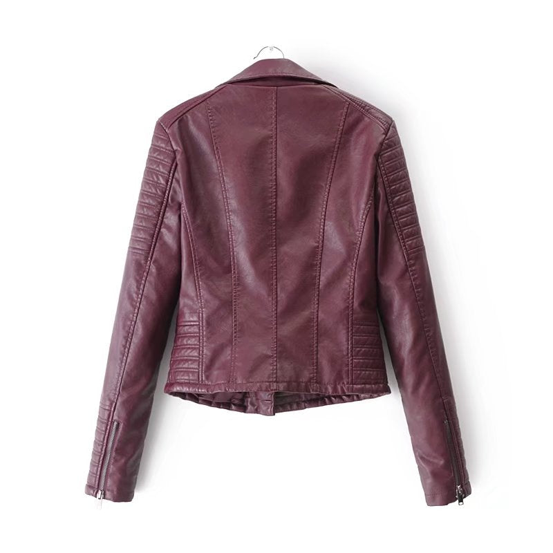 Back view of women's vintage PU leather motorcycle jacket in burgundy with quilted detailing.