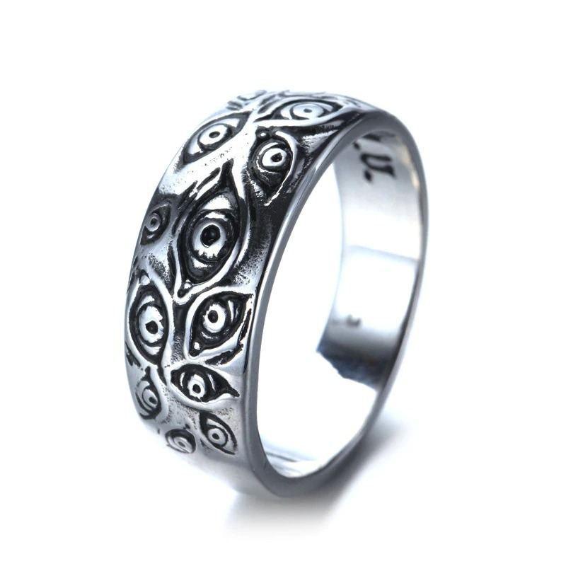 Vintage punk zinc alloy ring featuring carved eyes, perfect for unique and alternative style outfits.