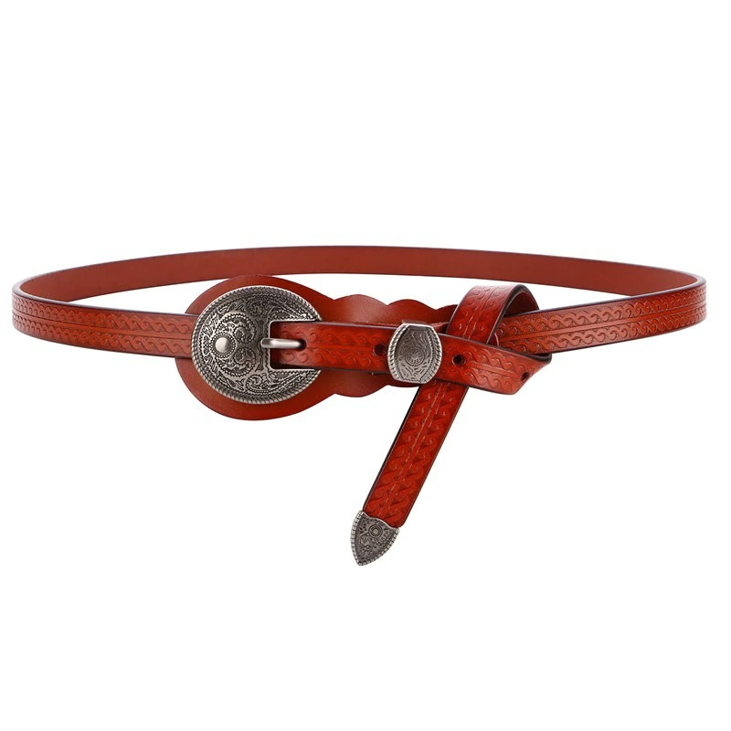 Vintage red leather belt with carved silver buckle, perfect for women's casual fashion accessories.
