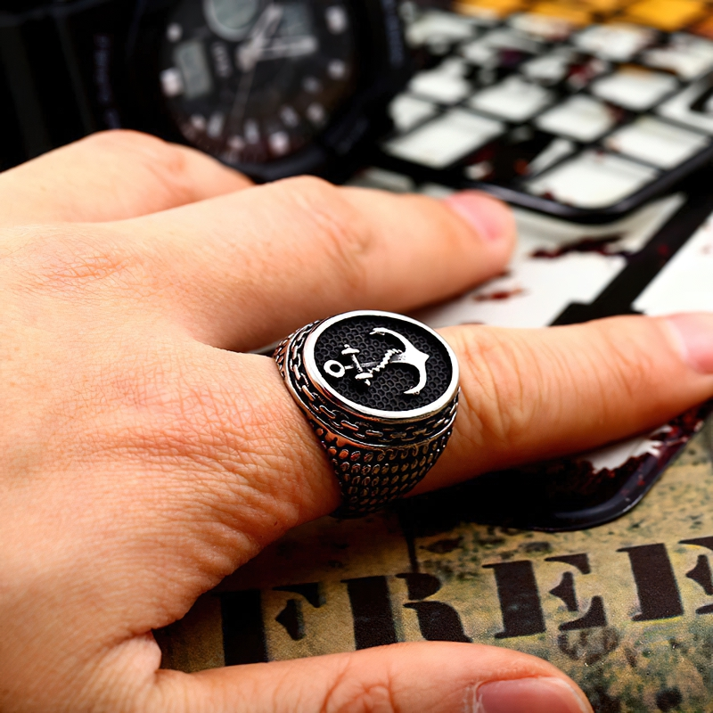Stylish unisex stainless steel anchor ring on hand, perfect alternative jewelry for men and women.