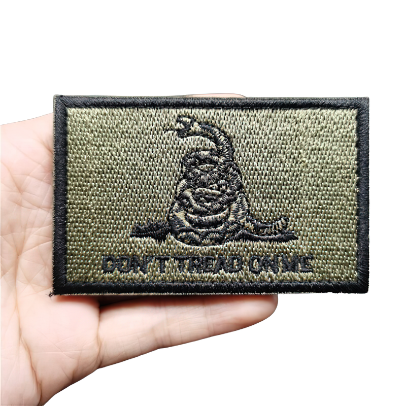 Vintage rock style patch featuring a snake design with 'Don't Tread on Me' text, perfect for jackets and bags.