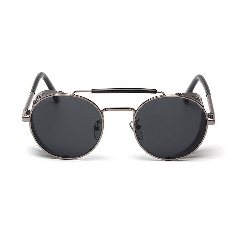 Vintage round metal sunglasses with polycarbonate lenses, perfect for adding retro vibes to any outfit.
