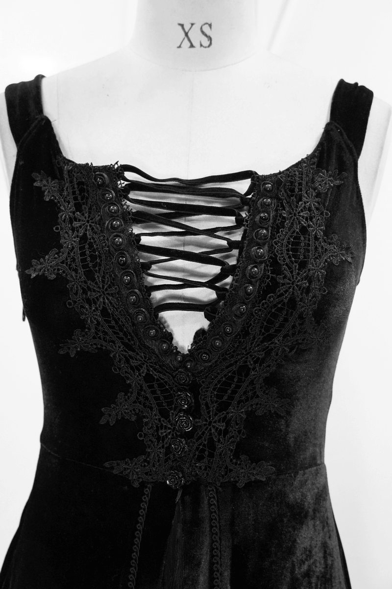 Close-up of a gothic black velvet dress with lace bodice and lace-up back detail, elegant and stylish for women's fashion.