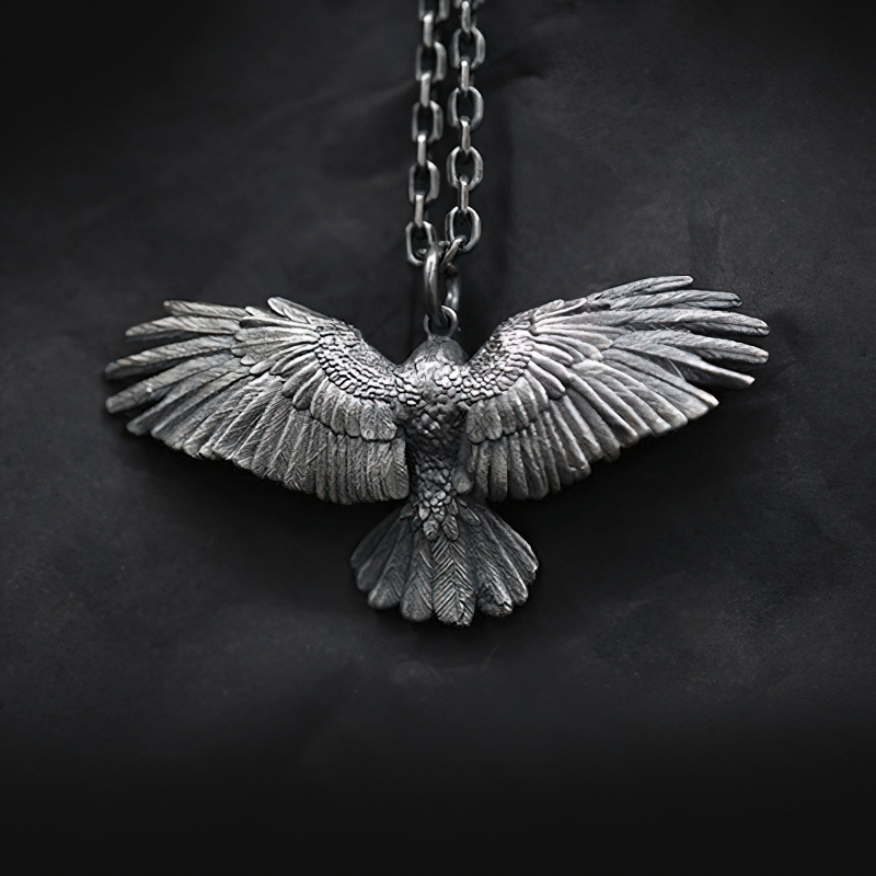 Vintage silver plated crow pendant necklace, unisex punk accessory showcasing intricate wing details.