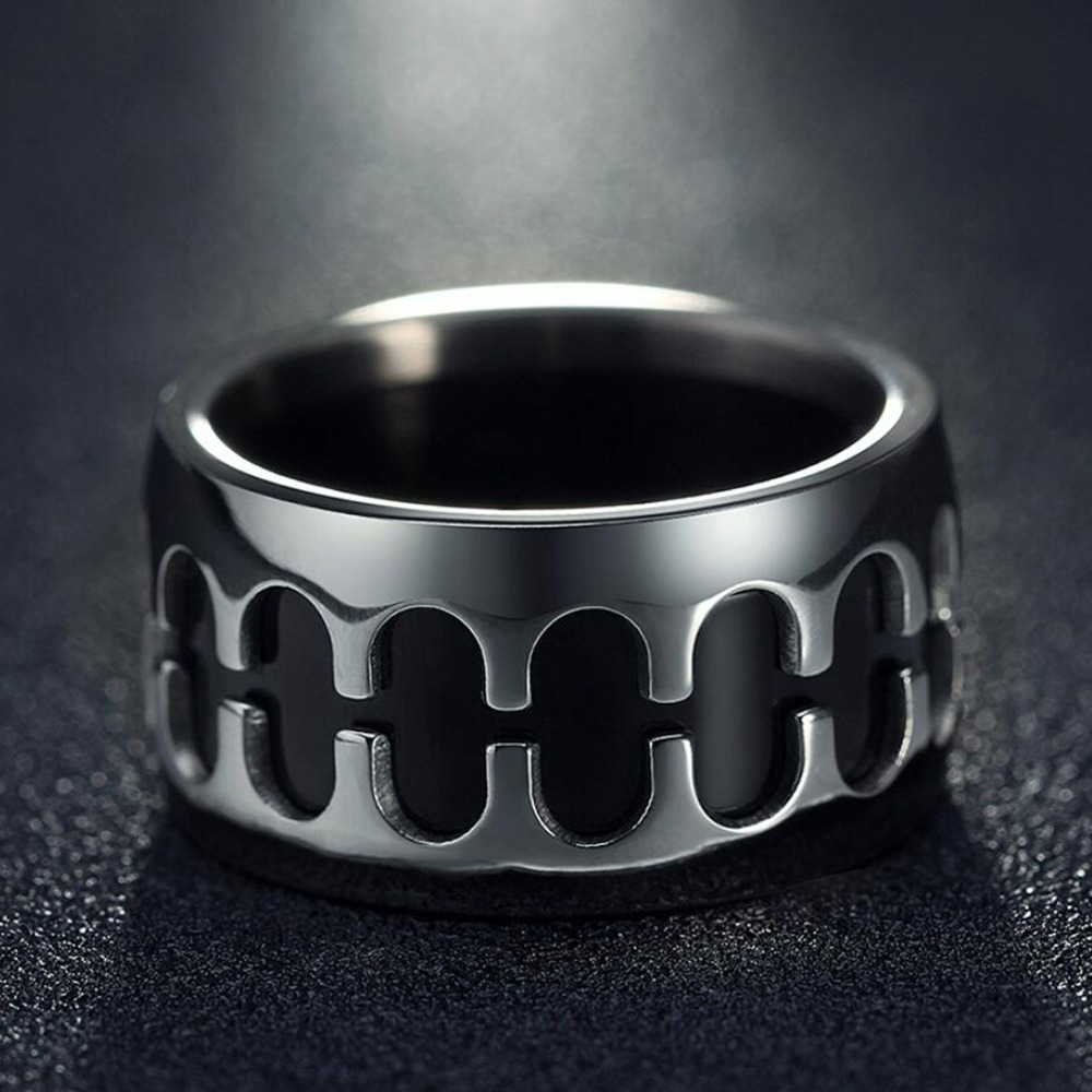 Vintage stainless steel band ring with unique cutout design for punk style unisex jewelry.