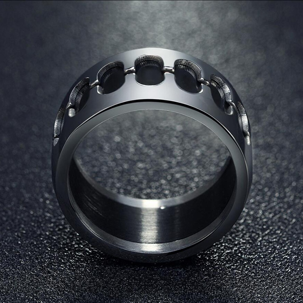 Vintage stainless steel band ring with unique design for punk style unisex jewelry, showcasing polished finish.