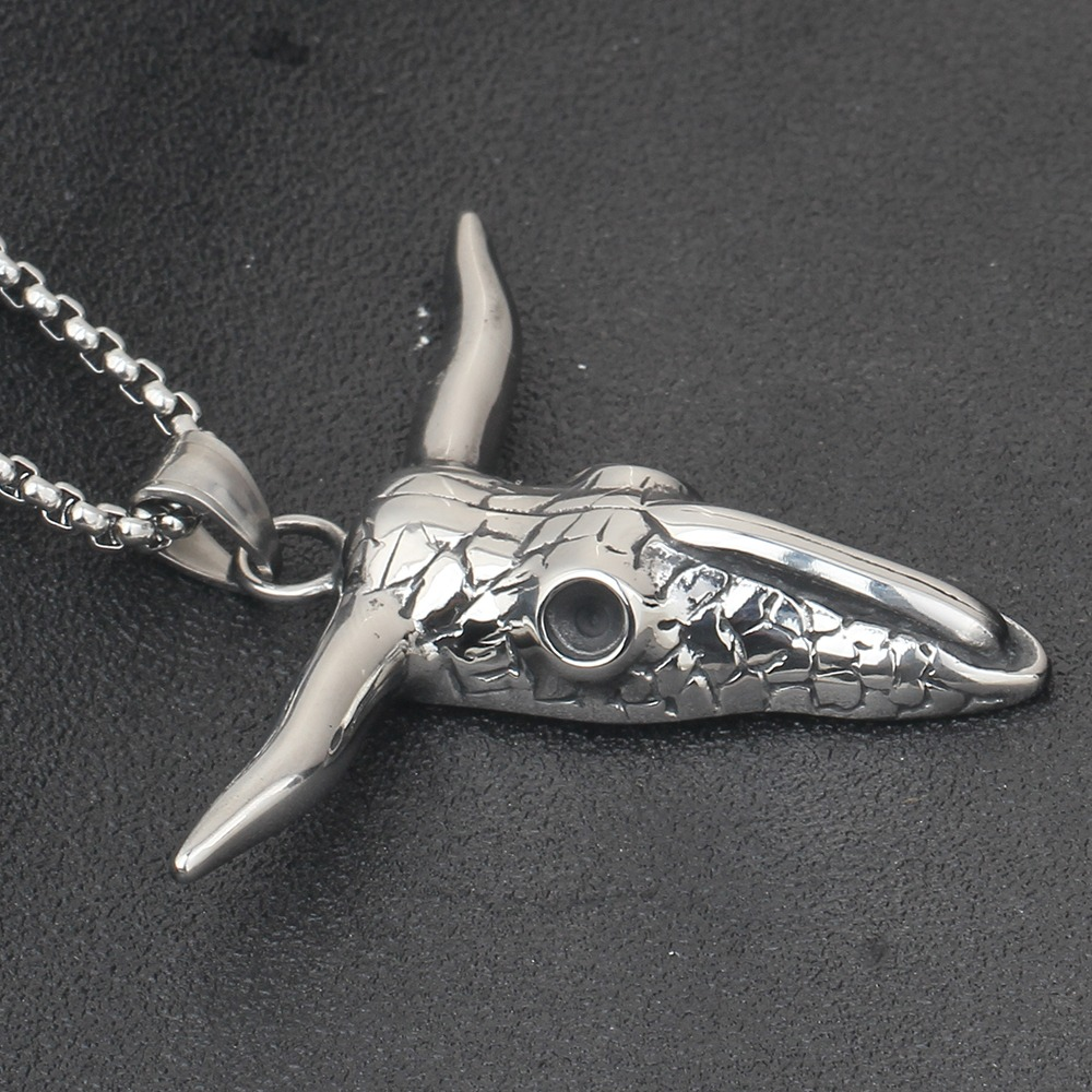 Vintage stainless steel bull head shape pendant necklace on a chain, perfect for alternative fashion jewelry.