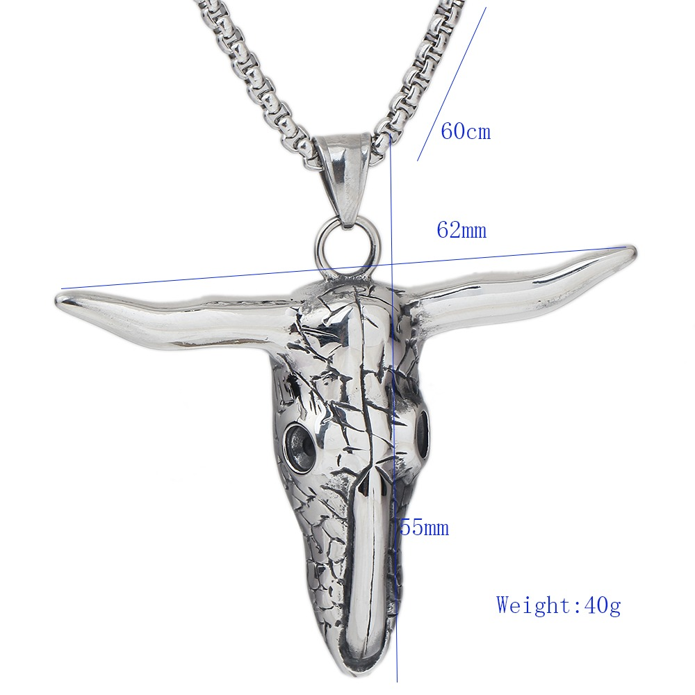 Vintage stainless steel bull head pendant necklace with intricate design, perfect for alternative fashion enthusiasts.