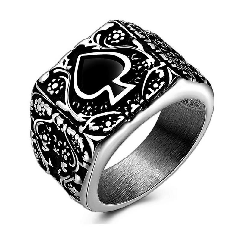 Vintage stainless steel men's ring with spades design, ideal for rock-style outfits.