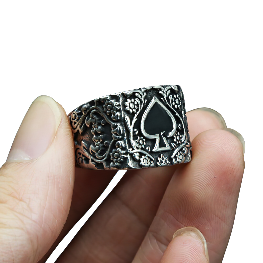Vintage stainless steel men's ring featuring a spade design, perfect for rock-style outfits.