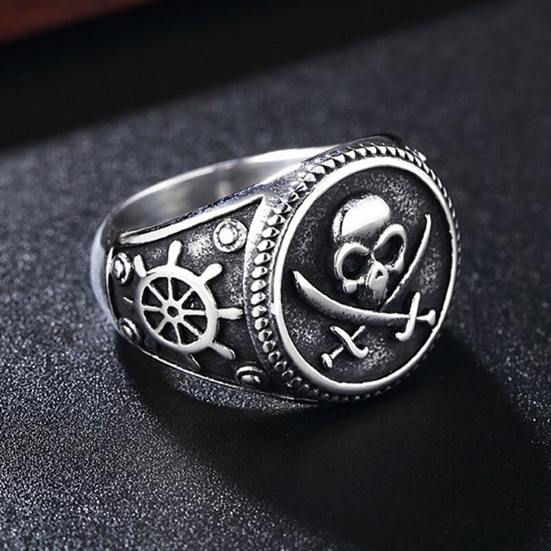 Vintage stainless steel pirate skull ring with ship wheel design, perfect unisex punk accessory for stylish outfits.