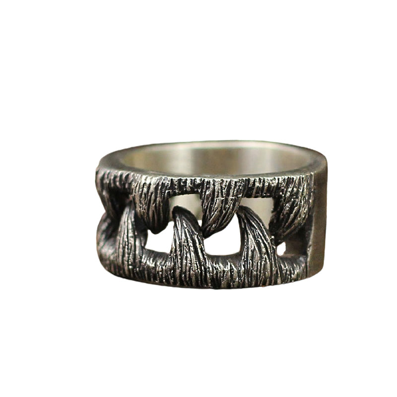 Vintage stainless steel monster teeth ring, unique Gothic unisex jewelry for alternative fashion lovers.