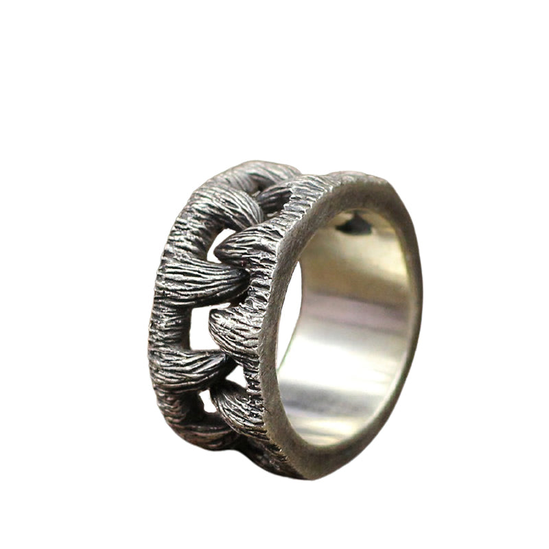 Vintage stainless steel monster teeth ring for men and women, unique gothic unisex jewelry accessory.