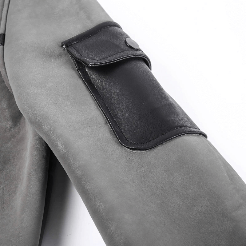 Close-up view of a grey leather jacket sleeve featuring a stylish black pocket, perfect for motorcycle enthusiasts.