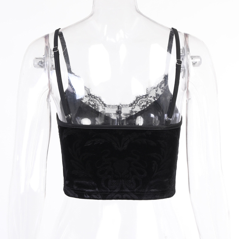 Back view of a vintage black velvet women's crop top with lace trim for a gothic style.