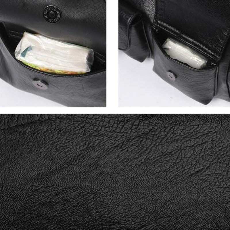Close-up of a black soft leather handbag showing multi-pocket design and interior storage compartment.