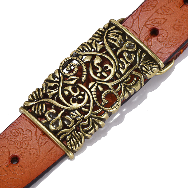 Vintage women leather belt with ornate hollow flower buckle, perfect for gothic fashion styles.