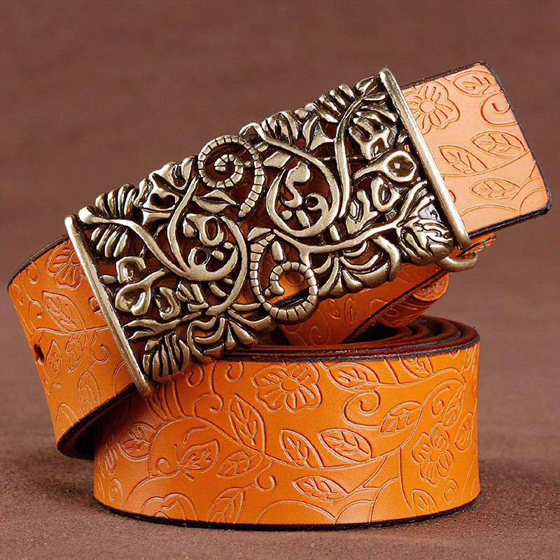 Vintage women leather belt with intricate metal buckle, perfect for gothic style outfits and fashion expression.