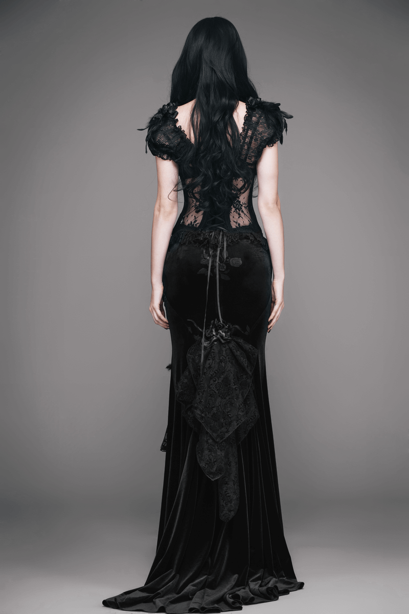 Elegant back view of a vintage women's goth skirt with short train in black lace.