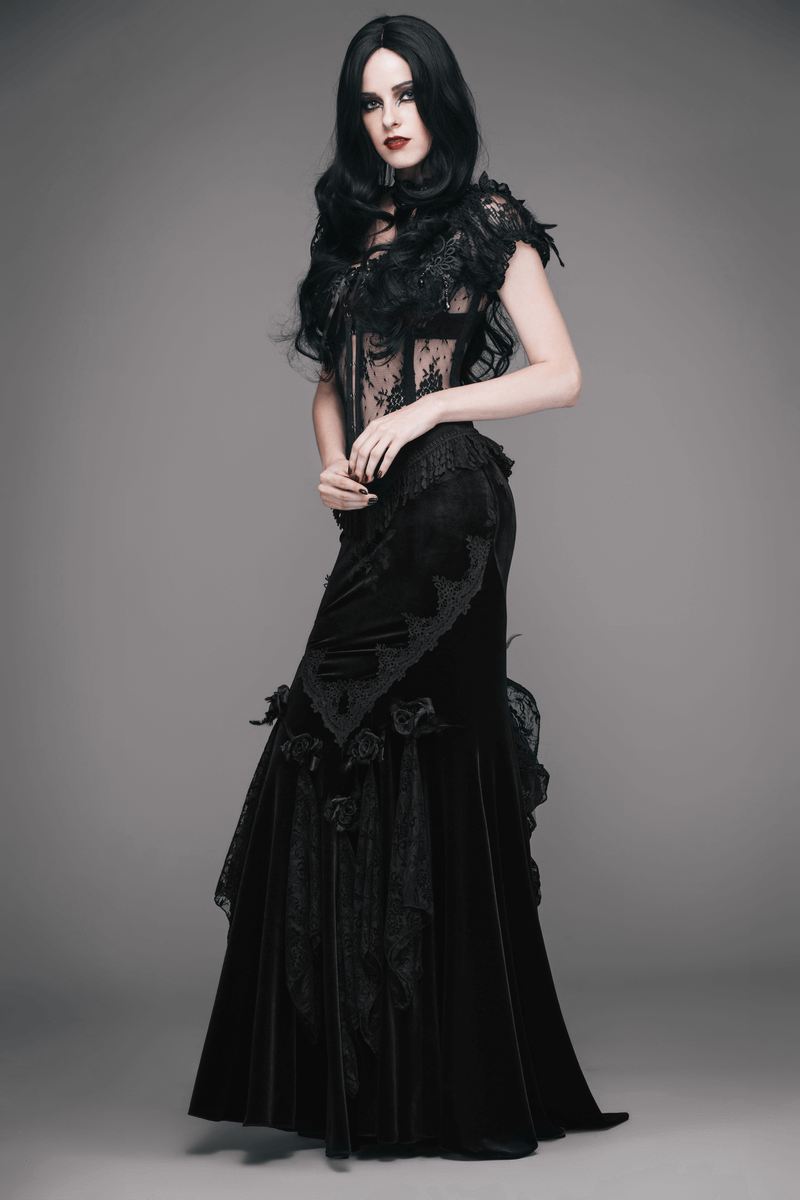 Elegant model in a vintage black gothic skirt with lace, showcasing exquisite embroidery and a mesmerizing long train.